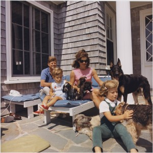 JFK and Jackie O on vacation with kids, dogs, and puppies.