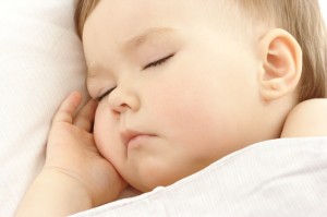 cute baby sleeping through the night