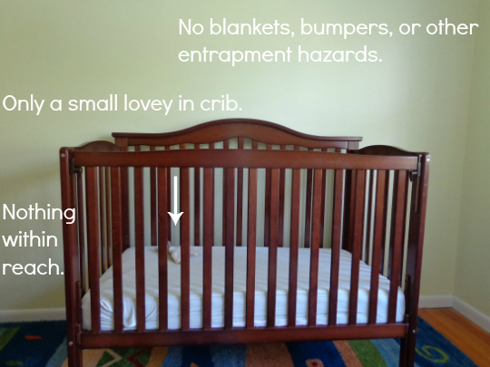 when to lower crib mattress aap